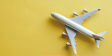Model Of A Passenger Plane On A Yellow Background. 3d Rendering, Travel Transport Concept