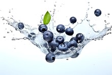 Blueberries Splashing With Clear Water Isolated On White Background