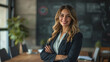 portrait photo of woman in business standing with a smile on her face