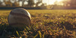 a ball of baseball on grass