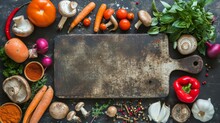 A Variety Of Fresh Vegetables And Spices On A Dark Background With A Wooden Cutting Board