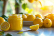 A jar of homemade lemon curd with fresh lemons