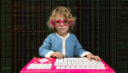 small infant girl with computer