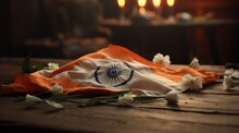 The Flag Of India On A Table With Flowers Around It