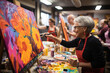 © David - A spirited group of seniors engaged in a group painting class, expressing their creativity and enjoying the meditative process of art.