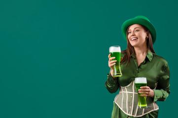 Poster - Young woman with beer on green background. St. Patrick's Day celebration