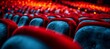 Close up of empty theater chairs in a movie theater, auditorium seats with no audience