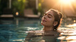 Portrait of a beautiful woman relaxing in the swimming pool in the afternoon
