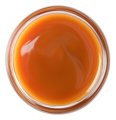 Sweet caramel sauce in bowl isolated.