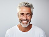 Fototapeta  - Beautiful close up portrait of mature handsome middle aged men smiling with beautiful white teeth on white background