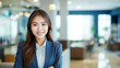 © Jonathan - Smiling Asian Business Woman Wearing Business Suit