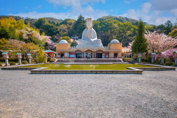 Wall Mural - Ryozen Kannon Temple is a war memorial dedicated to the fallen both sides of the Pacific War.The 24-meter statue of the Goddess of Mercy was built in 1955