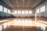 Fototapeta Do przedpokoju - A basketball arena, showcasing the wooden floor of a basketball court