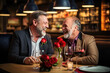 Caucasian man and man presenting gift box for each other. Friends or LGBT love couple happy together at restaurant. Boyfriends friendship, family holiday celebration