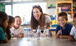 © pkproject - Teacher joyfully conducting a hands-on science experiment with eager young students