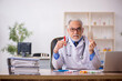 © Elnur - Old male doctor pharmacist in drugs synthesis concept
