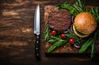 Classic american burger. hamburger with knife on slate board. Traditional fast food with copy space