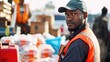 Photograph of African American dedicated disaster relief worker providing aid in a crisis zone