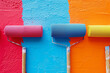 Rainbow paint roller with print. Full frame shot of multi colored textiles. Colour spectrum. Roller to paint a colorful. Top view. Flat lay. Colorful paint trails