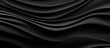 © Muhammad - bastrack black fabric wave background