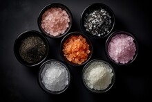 Assorted Gourmet Salts In Bowls Including Hawaiian Lava Indus Fleur De Sel Rock And Sea Salt Seen From Above