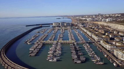 Wall Mural - Brighton Marina in East Sussex, Southern England, with Brighton beach in view, a popular holiday destination, aerial video.