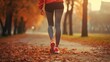 Back view of close-up of a woman's leg walking in autumn park,she have sports cloths, instagram style, copy space