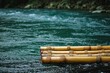 bamboo raft floating on a calm rive