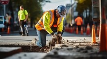 A Worker's Commitment To Safe Roadworks On Busy Streets