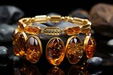 Fototapeta  - An exquisite and expensive amber bracelet on the hand.