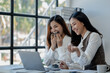 © PHOTO4U - Joyful businesswoman freelancer entrepreneur smiling and rejoices in victory while sitting at desk after working finishing project, Excited happy woman, overjoyed motivated.