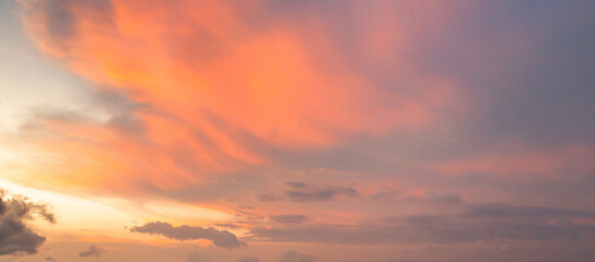 Wall Mural - Sunset sky. Abstract nature background. Dramatic blue with orange colorful clouds in twilight time.