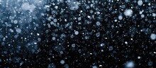Snowstorm Stock Image With Falling Snow On Black Background.