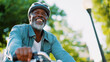 Happy mature senior black african american man riding his bicycle through a park on a sunny day, ai generated