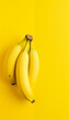 © Maownie Studio - Healthy bunch of fresh yellow bananas on a white background, perfect for a nutritious and delicious snack