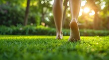 A close-up view of a woman strolling barefoot across verdant lawn with sun rays, space, Generative AI.