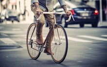 Man On A Retro Bicycle On A City Street, Movement In Casual Style