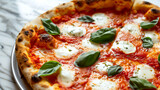 Fototapeta  - italian pizza margherita with mozzarella basil and tomato