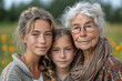 © Evhen Pylypchuk - three generation of positive women smiling while looking at camera