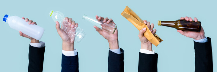 Businessman's hand holding garbage waste on isolated background. Eco-business recycle waste policy in corporate responsibility. Reuse, reduce and recycle for sustainability environment. Quaint