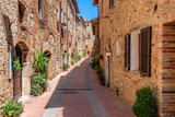 Fototapeta Panele - The picturesque village of Casole d'Elsa on a sunny summer morning. Province of Siena, Tuscany, Italy