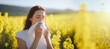 A young girl is suffering from a spring pollen allergy