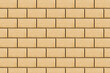 Yellow brick pavement texture. Even blocks pattern. Brick flooring. Outdoor sunny texture. Walkway background. Brick pattern. Closeup construction.