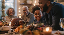 Family Gathered Around A Dinner Table, Enjoying A Festive Meal With A Roasted Turkey, Smiling And Engaging In Lively Conversation.