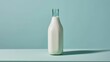  a bottle of milk on a table with a light green wall behind it and a light blue wall behind it and a light blue wall behind the bottle of milk.
