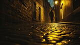 Fototapeta Fototapeta uliczki - A man walks on a narrow and stony street