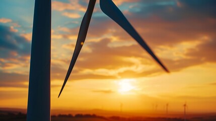 Wall Mural - Close up of a wind turbine at sunset. Alternative energy source.   