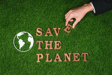 Eco awareness campaign for Earth day concept showcase message arranged in Save Earth on biophilic green background. Environmental social governance concept idea for sustainable and greener future.Gyre