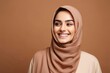 © talkative.studio - Photo of a beautiful young muslim woman smiling