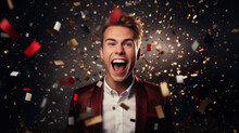 An Exuberant Young Man In A Red Jacket, His Face Expressing Sheer Joy Amidst A Shower Of Golden Confetti.
